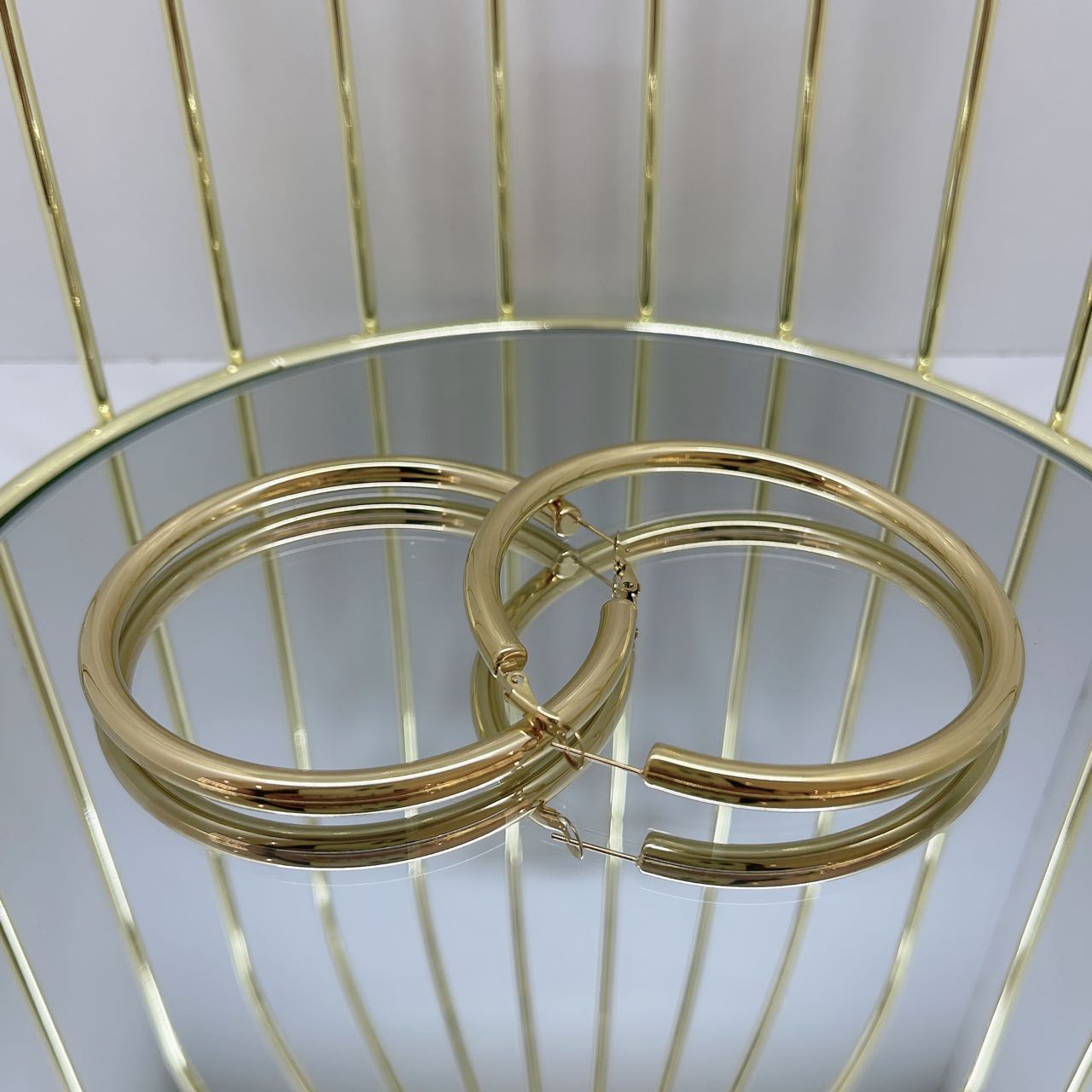 orecchini cerchio bomber