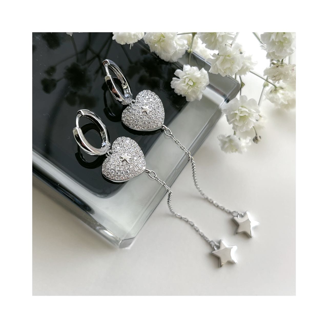 orecchini stella pendente